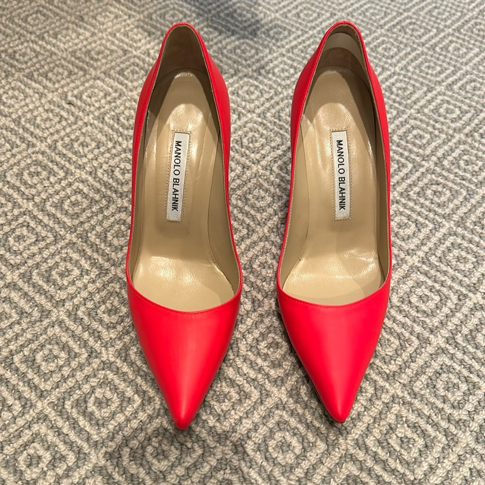 Manolo Blahnik neon pink/orangey high heels. Worn once. 37.5 EUC